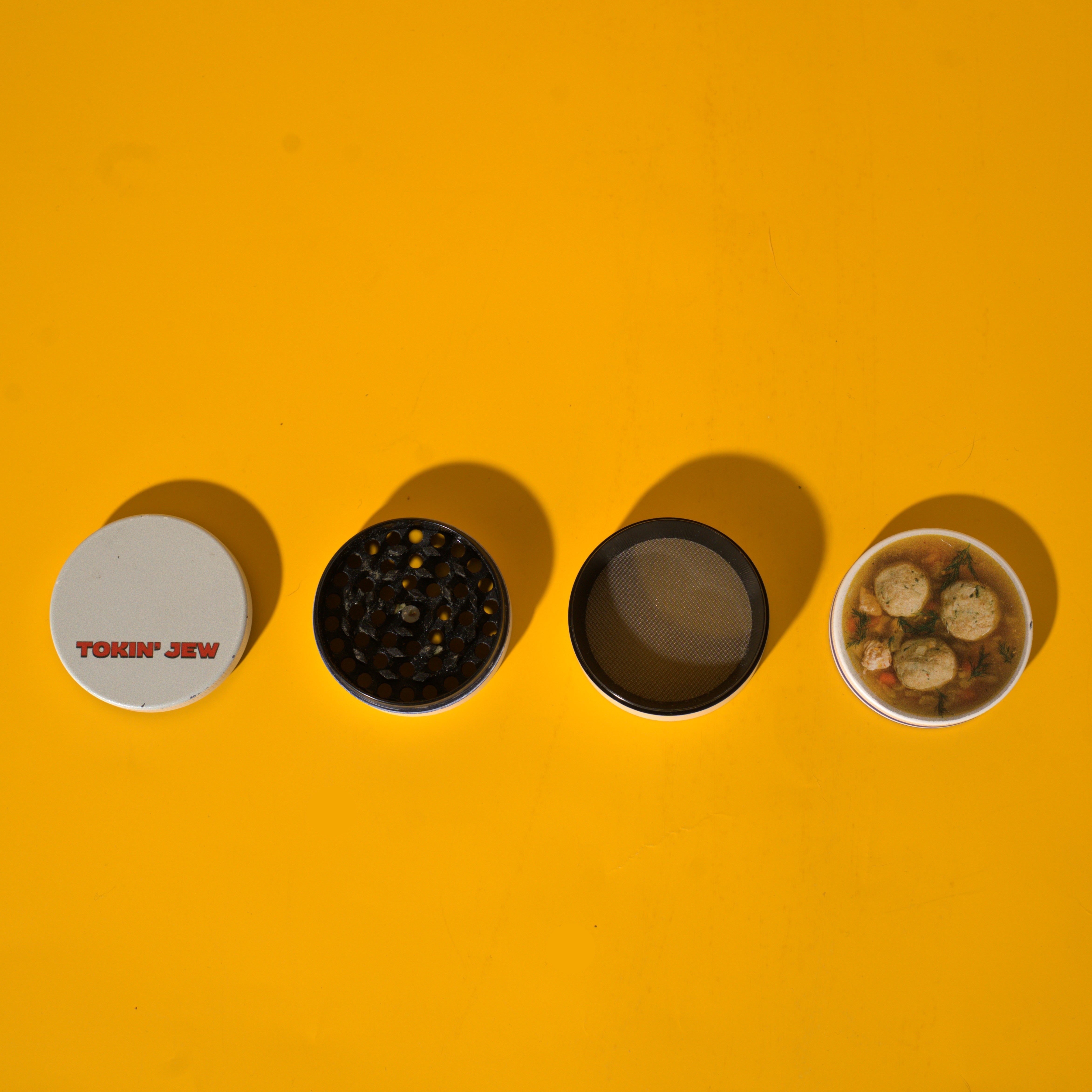 Tokin' Jew matzo Ball Soup Grinder arranged on a yellow background