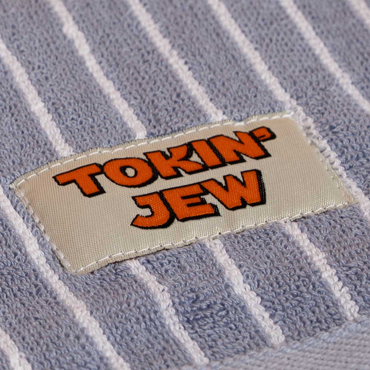 House towel with 'Tokin' Jew' label