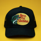 Black cap with 'Bass Pro Shabbos' logo on a yellow background