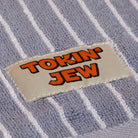 House towel with 'Tokin' Jew' label 